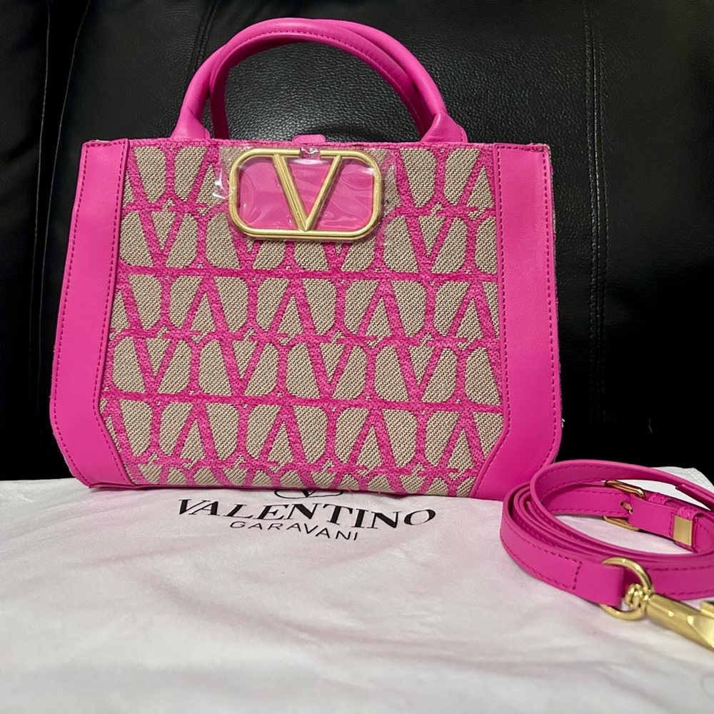 Valentino Pink Satchel with Structured Design and Cutout Pattern